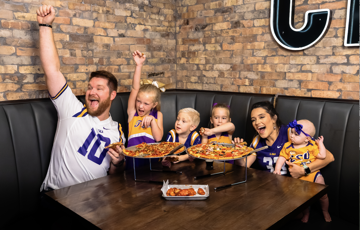 Guests enjoying Crust pizza together